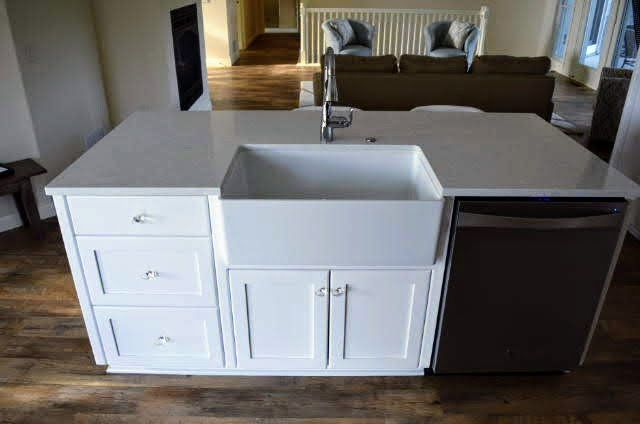 Painted cabinets - flat panel - full overlay - Cambria quartz countertops - farm sink